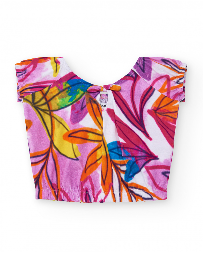 T-shirt pour fille en blanc avec imprimé tropical et nœud dans le dos.