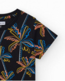 T-shirt pour garçon en noir avec imprimé tropical.