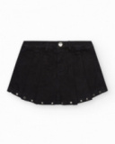 Jupe-short pour fille en noir avec détails métalliques.