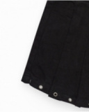 Jupe-short pour fille en noir avec détails métalliques.