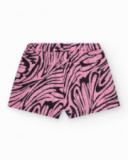 Short pour fille en rose avec imprimé animal et taille élastique.