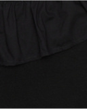 Top pour fille en noir avec design asymétrique et clous métalliques.