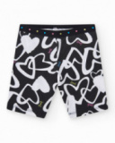 Legging cycliste pour fille en noir avec cœurs imprimés et taille décorée de clous.