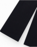 Pantalon pour fille en noir avec taille élastique et cordon de serrage.