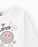 T-shirt pour fille en blanc, à manches longues, décoré avec des graphiques.
