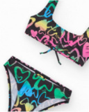 Bikini pour fille en noir avec cœurs imprimés et nœud décoratif.
