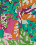 Chemise pour fille avec imprimé tropical et nœud à l’avant.