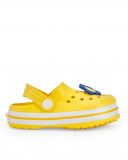 Zuecos para niña en amarillo con flor decorativa