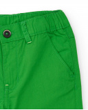 Bermuda para niño en verde con estampado de palmera