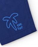 Bermuda para niño en azul con estampado de palmera