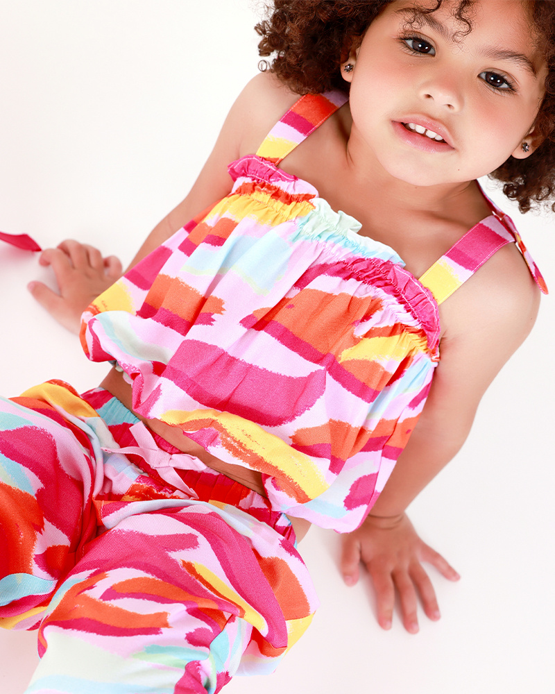 Top rose pour fille avec imprimé multicolore et nœuds aux bretelles