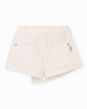 Jupe-short fille en écru avec poches décoratives