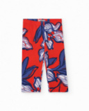 Legging fille en rouge avec imprimé fleuri bleu