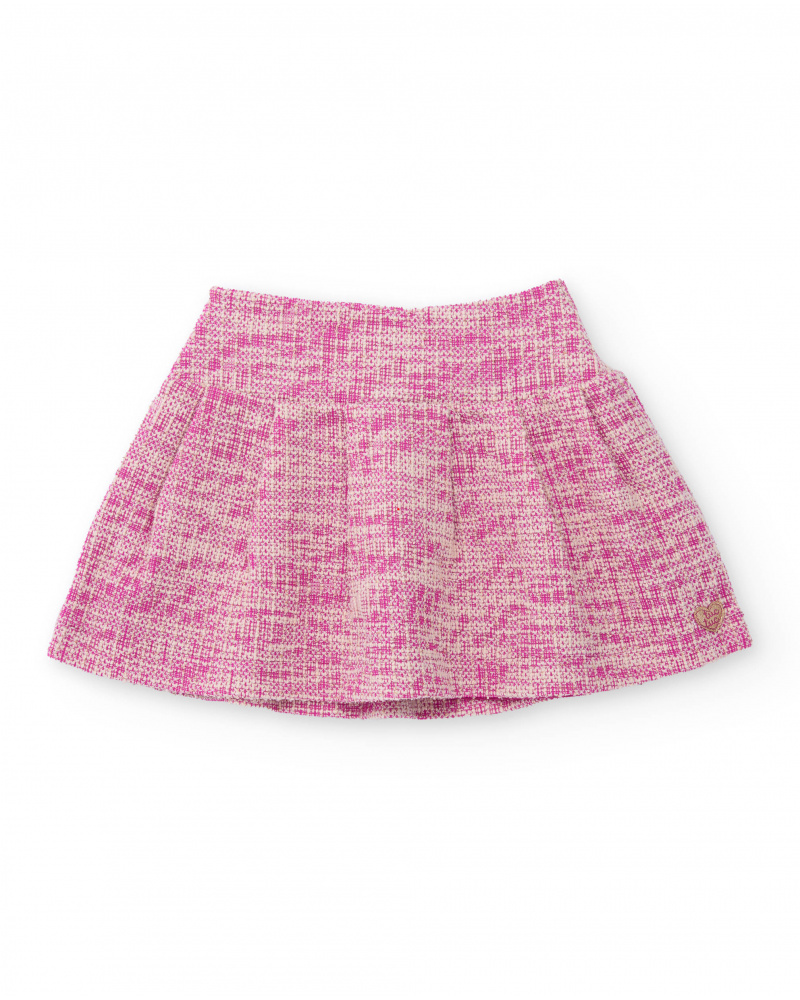 Jupe pour fille en rose avec coupe évasée.