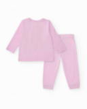 Pyjama en tricot pour fille couleur rose avec imprimé de macarons. Pyjama en tricot pour fille couleur rose avec imprimé de macarons.
