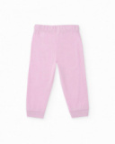 Pyjama en tricot pour fille couleur rose avec imprimé de macarons. Pyjama en tricot pour fille couleur rose avec imprimé de macarons.