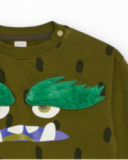 Sweat-shirt pour garçon de couleur verte avec imprimé de monstre et détails en relief.