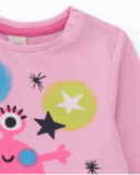 T-shirt à manches longues rose pour fille avec imprimé monstre et étoiles.
