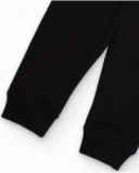 Pantalon en molleton noir avec cordon rouge pour garçon.