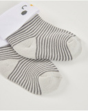 Chaussettes en tricot pour nouveau-né à rayures grises with poignet blanc et détail pingouin