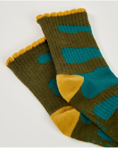 Lot de chaussettes pour fille avec imprimés de monstre fleuri et détails en tons vibrants.