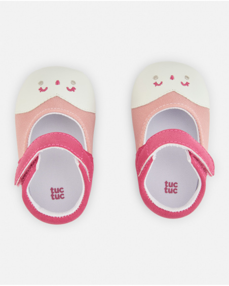 Chaussure pour nouveau-né dans les tons roses avec fermeture velcro