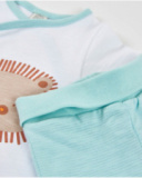 Ensemble tricot pour nouveau-né avec ouverture latérale