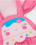 Ensemble en tricot pour nouveau-né avec visage souriant