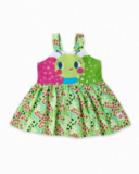 Abito verde in maglia da bambina con applicazioni collezione