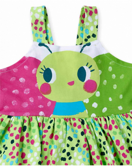 Abito verde in maglia da bambina con applicazioni collezione