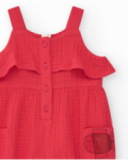 Tutina rossa per bambina con volant e tasche con applicazione di pesce Tutina rossa per bambina con volant e tasche con applicazione di pesce