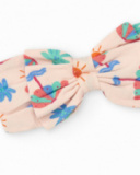 Diadema di maglia per bambina rosa con stampa tropicale di palme e soli Diadema di maglia per bambina rosa con stampa tropicale di palme e soli