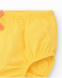 Vestido melocotón para niña con estampado floral y tirantes