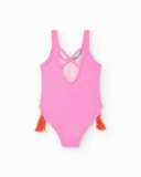 Bañador rosa para niña con estampado tropical y borlas laterales