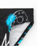 Slip da bagno per bambino nero con stampa colorata Slip da bagno per bambino nero con stampa colorata