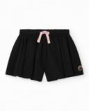 Completo per bambina con blusa rosa e pantaloncini neri plissettati