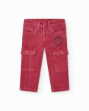 Pantaloni in maglia per bambino rosso con effetto sbiadito e tasche