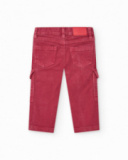 Pantaloni in maglia per bambino rosso con effetto sbiadito e tasche