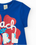 T-shirt per bambina blu con stampa "Beach Girl" e chiusura sul retro T-shirt per bambina blu con stampa "Beach Girl" e chiusura sul retro