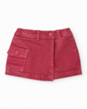 Gonna-pantalone per bambina rossa con vita regolabile e tasca Gonna-pantalone per bambina rossa con vita regolabile e tasca