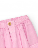 Pantaloni cargo per bambina rosa con tasche e polsini elastici | tuc tuc