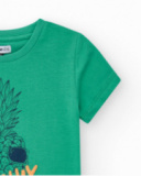 Maglietta per bambino in verde con stampa.