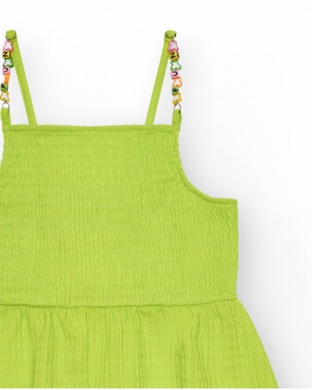 Tuta per bambina in verde con spalline e dettagli multicolori.