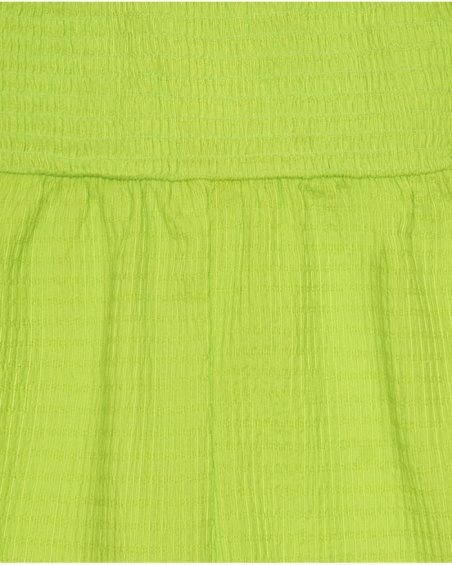 Tuta per bambina in verde con spalline e dettagli multicolori.