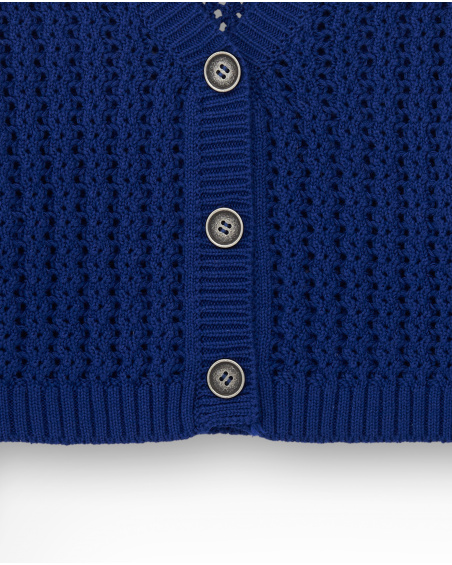 Giacca per bambina in blu con bottoni decorativi.