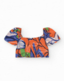 Set con camicia corta e gonna per bambina in arancione e blu con stampa floreale.