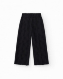 Pantaloni per bambina in nero con vita elastica e ricamo.