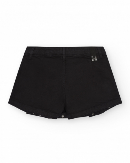 Gonna-pantalone per bambina in nero con dettagli metallici.