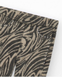 Pantaloni per bambina in nero con stampa animalier e borchie in vita.