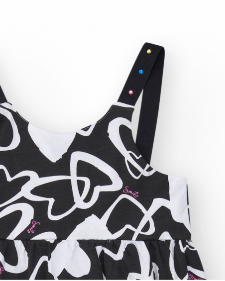Vestito per bambina in nero con spalline regolabili e applicazioni.